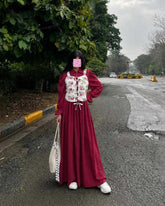 Mahroon frock with white flower corset
