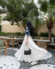 Elegant blue print top with full.flair white skiet