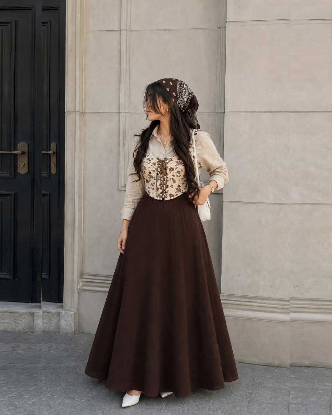 Beautiful printed corset with beige shirt % brown skirt