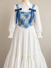 Long sleeves with ruffle cuffs, button-down collar, tiered hem, bow-tie straps