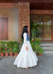 Long sleeves with ruffle cuffs, button-down collar, tiered hem, bow-tie straps