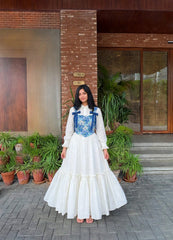 Long sleeves with ruffle cuffs, button-down collar, tiered hem, bow-tie straps